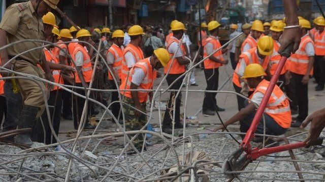 Workers at collapsed flyover site