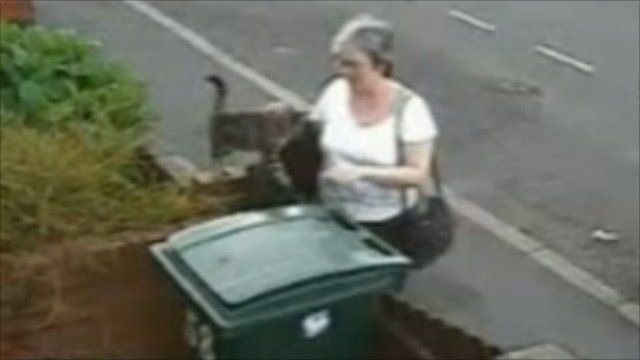 CCTV images of the cat being put in the bin