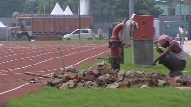 Worker finishing the athletics track