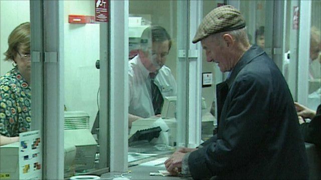 A pensioner withdrawing his pension