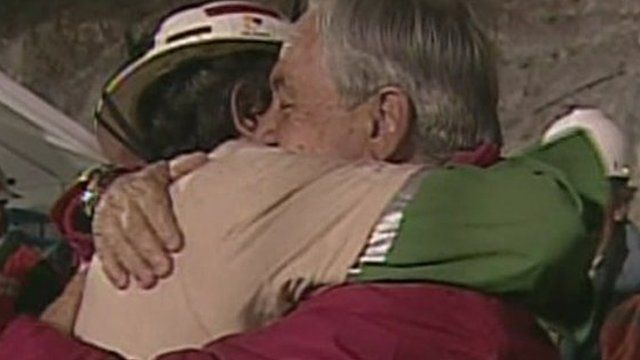 Juan Aguilar embraces Sebastian Pinera