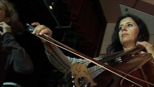 Woman playing cello