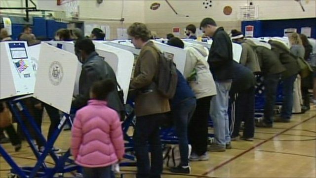 Voters in voting booths