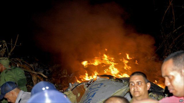 Wreckage of plane on fire