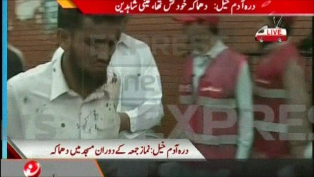 Injured person outside mosque