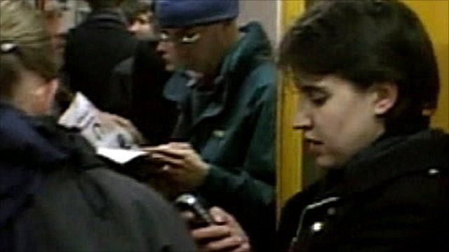 Passengers standing on a train