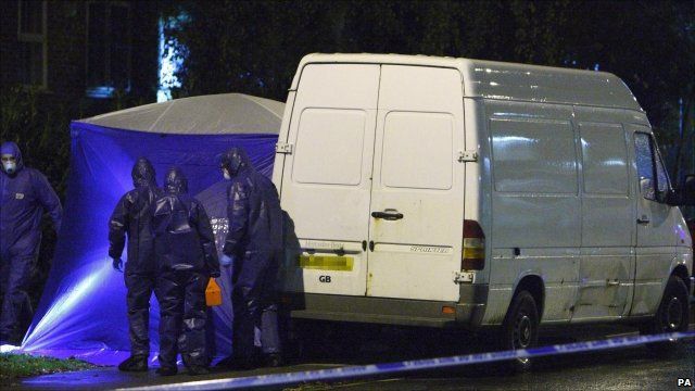 Police investigators with the van in Sunningdale