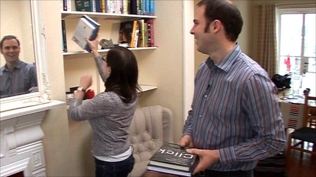 Couple unpacking in new rented home