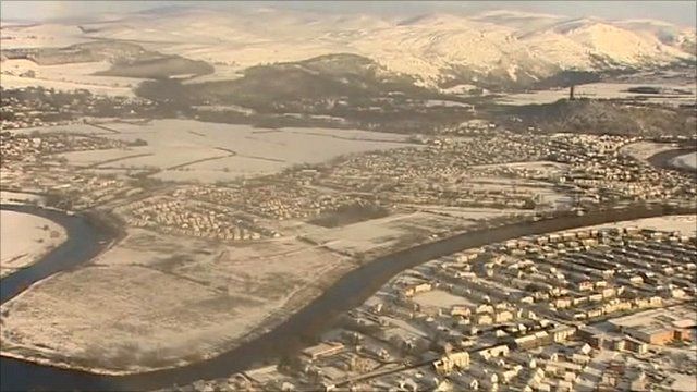 Aerial views of snowbound Scotland