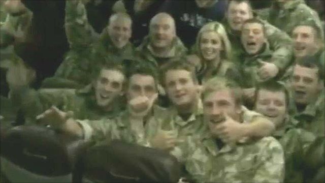 Katherine Jenkins with troops on the plane