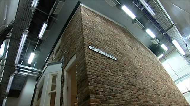Worm's-eye view of house built inside laboratory