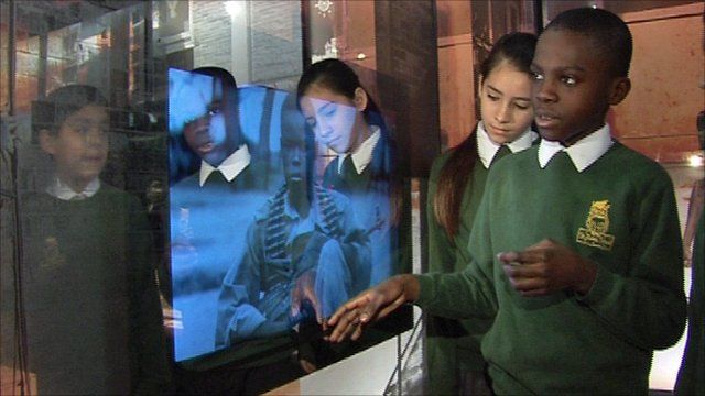 Local pupils tour the exhibition