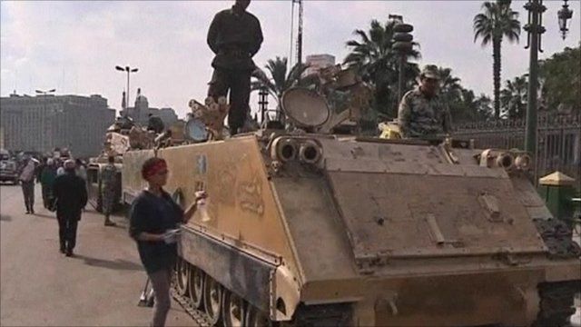 Demonstrator wiping down a tank