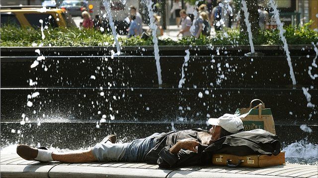 A man in New York cools down during the heat-wave