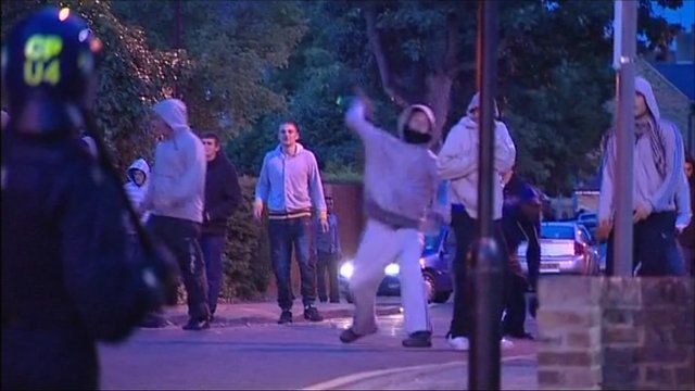 Police clash with riot police