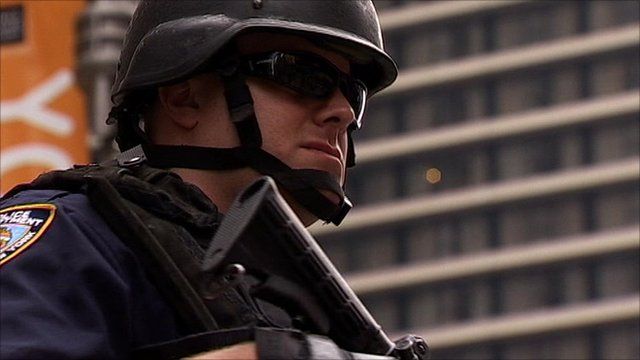 Armed NYPD officer