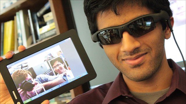 Carnegie Mellon student wearing facial recognition glasses