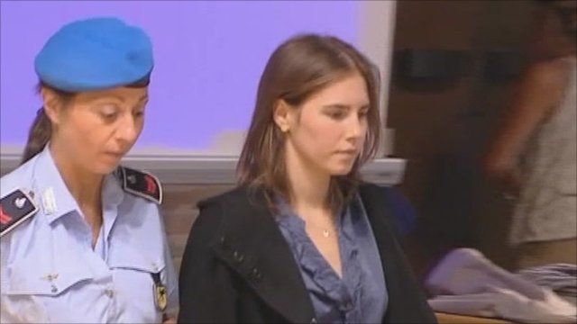 Amanda Knox walked into court with security guard