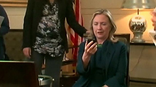 Hillary Clinton receives the news