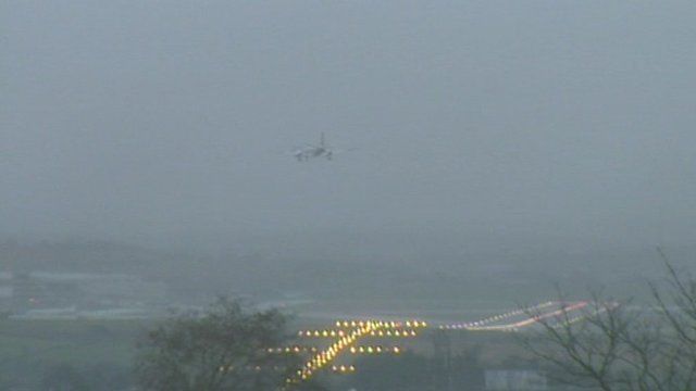Plane hovers above the runway in an abortive landing at Aberdeen Airport.