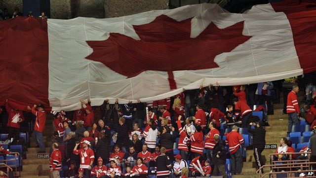 Canada flag and Canadian hockey fans