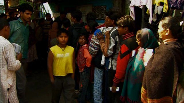 Lining up to register onto India's Unique Identity Number database