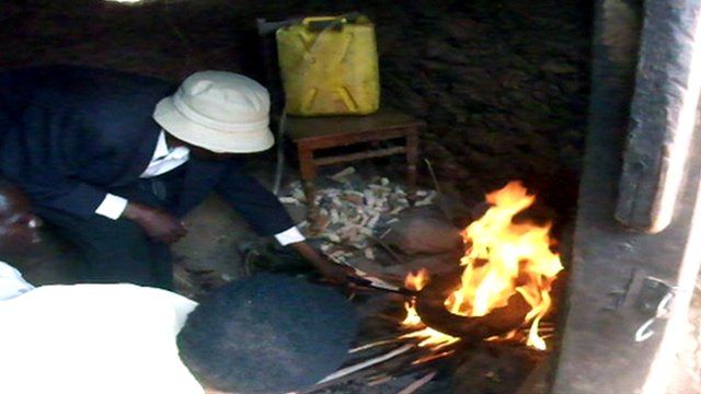 People using the "Jompy Boiler" over a fire