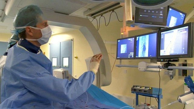 Tom Carrell Consultant Vascular Surgeon using touchless technology
