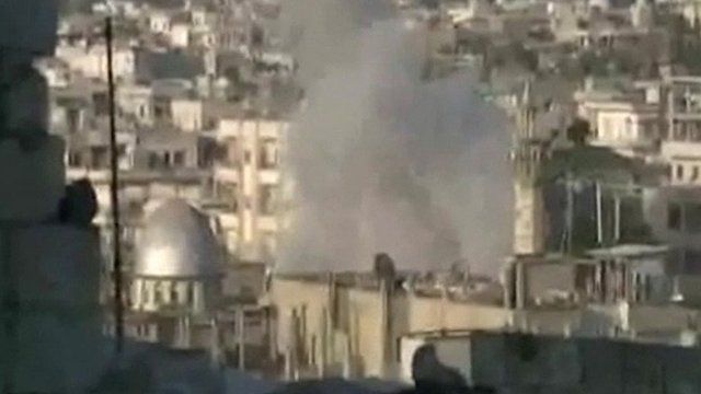 Smoke rises over city