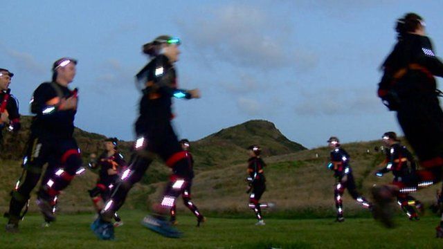 Runners on Edinburgh's Arthur's Seat