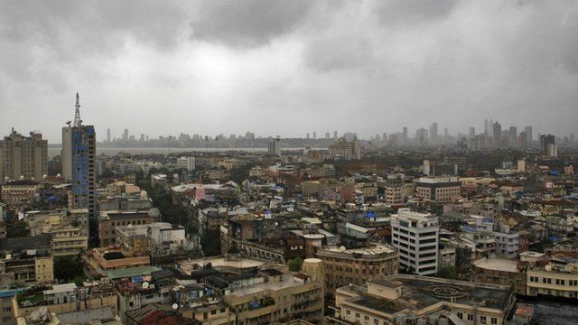 Monsoon clouds loom over Mumbai's skyline. Are dark clouds looming over the economy?