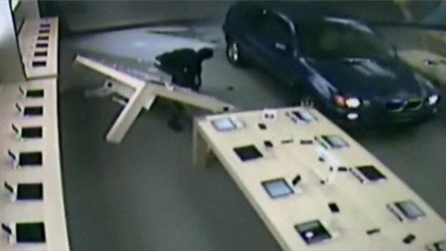 Car and robber in Apple store