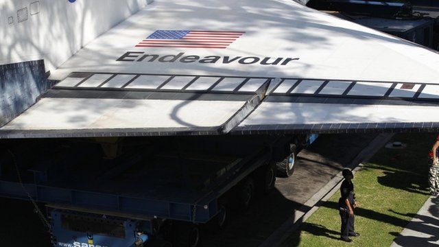 Space shuttle Endeavour on back of vehicle