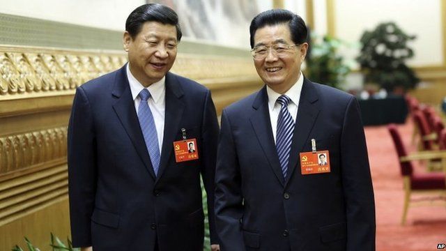 Outgoing and incoming leaders Hu Jintao (R) and Xi Jinping (L) pictured on 7 November 2012