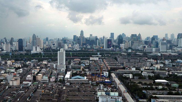 clouds loom over the Bangkok skyline
