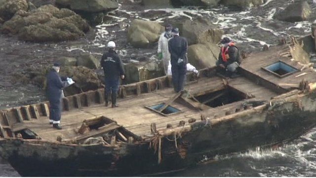 The boat was washed ashore near an island off Japan