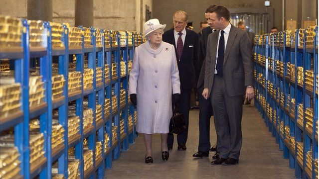 The Queen and Prince Philip in the gold vault of the Bank of England