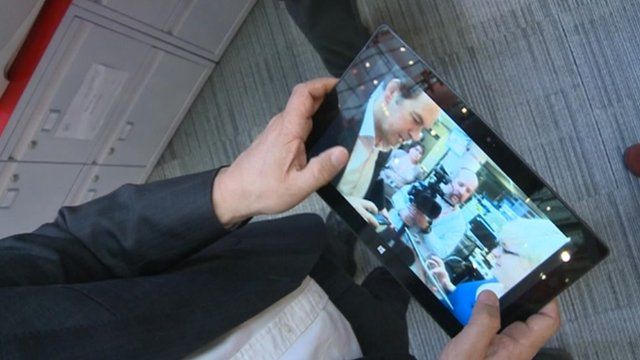 Rory Cellan-Jones holding tablet