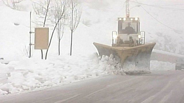 A snow plough shovels snow in Lebanon