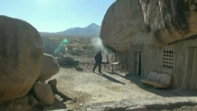 Benito Hernandez outside his cave home
