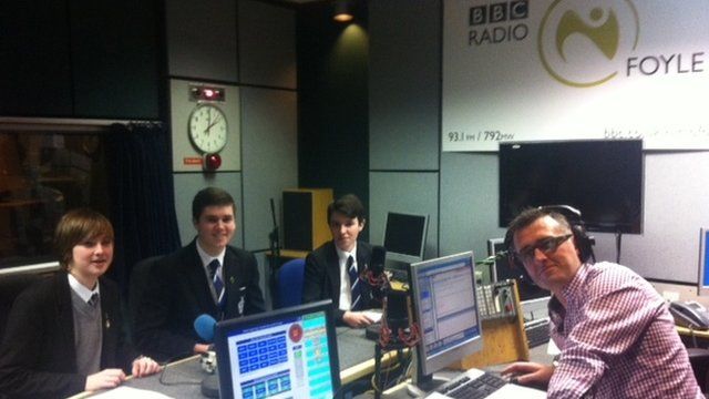 Garry (left), Jack (centre) and Kane (right) from St Columb's College with BBC Radio Foyle presenter Mark Patterson