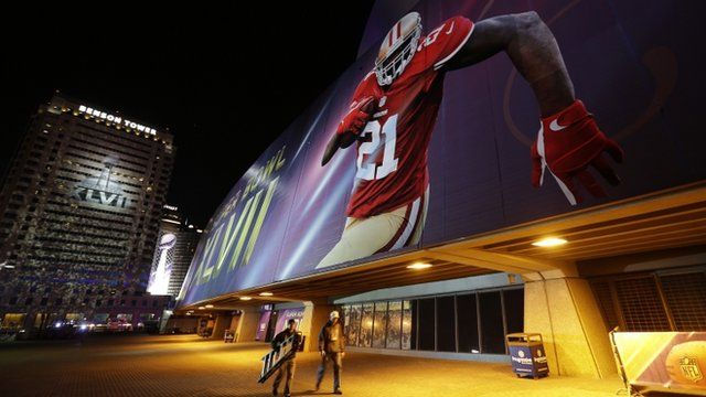 Workers continue preparations outside the Mercedes Benz Superdome