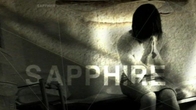 Graphic showing woman sat with head in hands