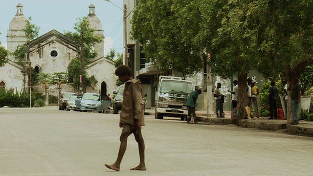 A street scene in Quelimane with the city's cathedral in the background
