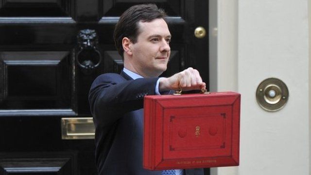 Chancellor of the Exchequer George Osborne holding the Budget box on Budget Day 21/03/2012