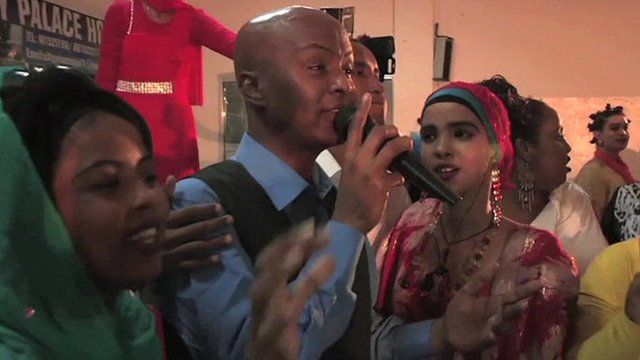 Men and women singing and dancing during a concert in Mogadishu