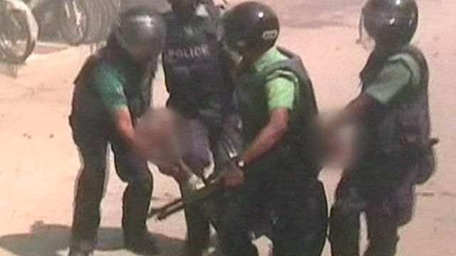 Police carry injured officer