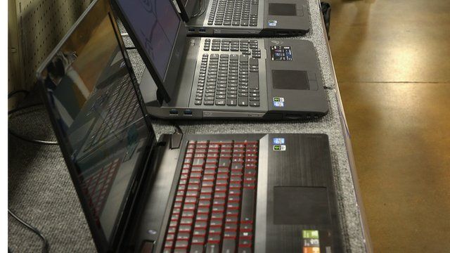 row of computers for sale in shop