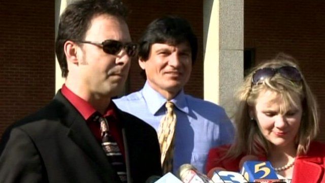 Paul Kevin Curtis (far left) outside court