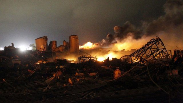 The remains of a fertilizer plant burn after an explosion at the plant in the town of West, near Waco